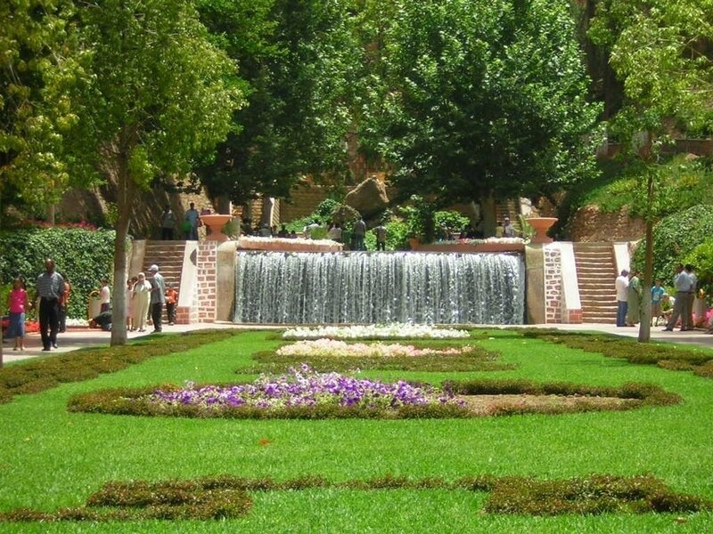 Garden with Waterfall and Flowers