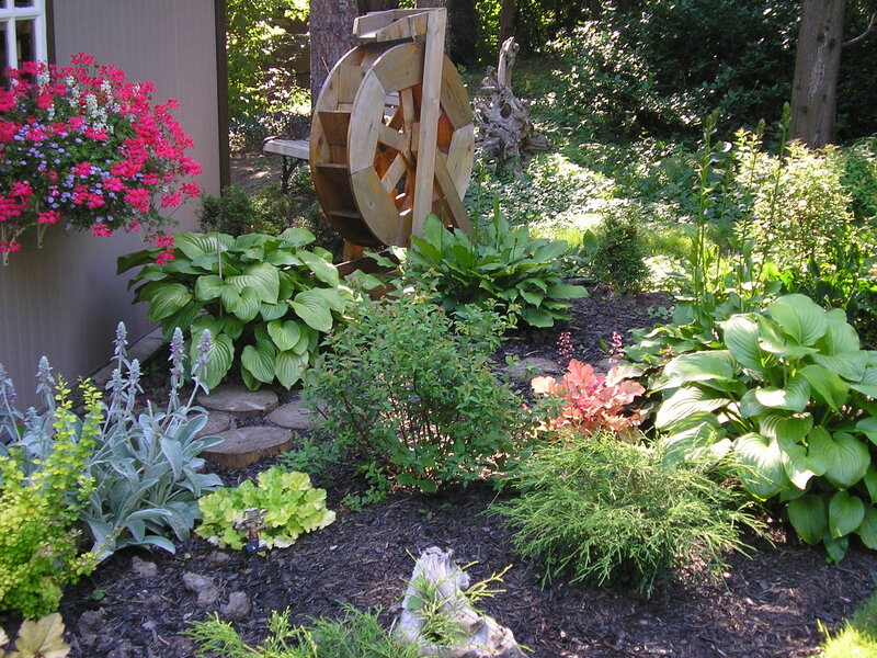 Garden with Wooden Wheel