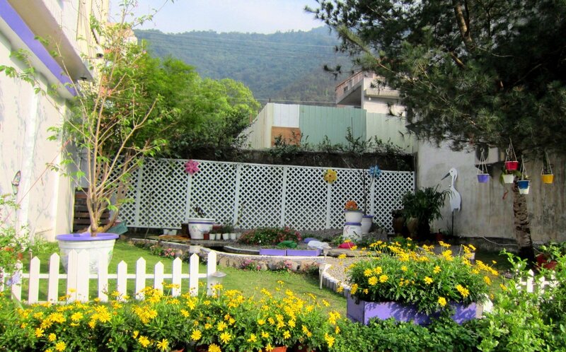 Garden with Yellow Flowers — Serene