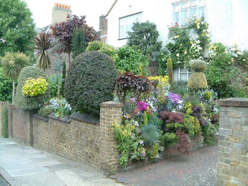 Gardens Behind Brick Wall