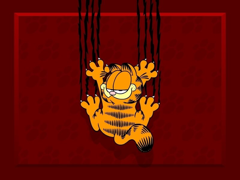 Garfield hanging from vines