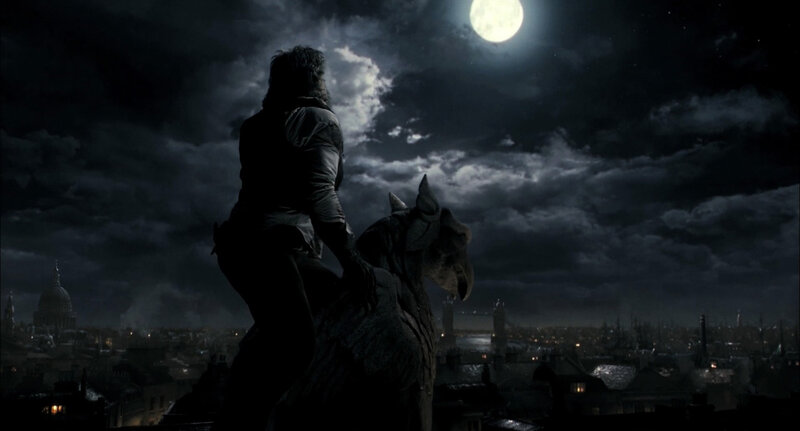 gargoyle statue at night
