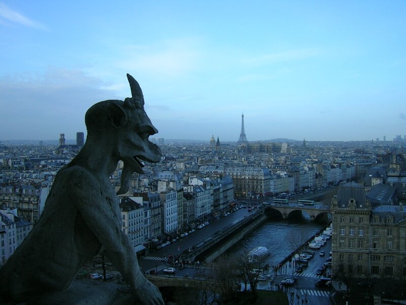 Gargoyle Statue Overlooking City — Blue