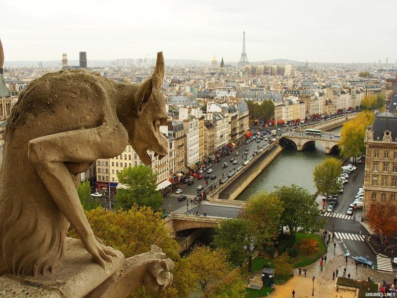 Gargoyle Statue Overlooking City — Gray