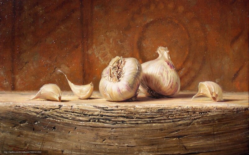 Garlic on wooden surface
