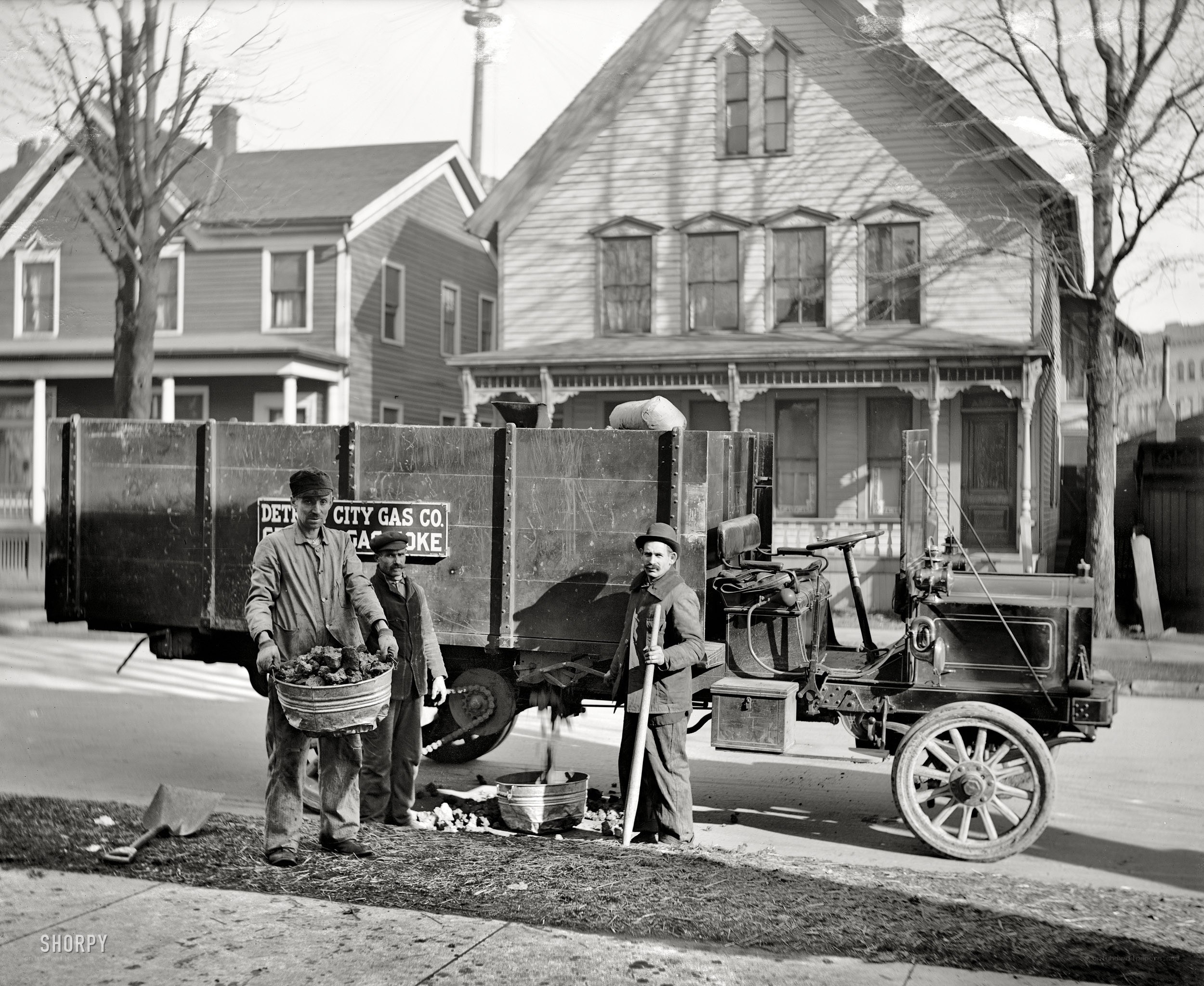 Gas company workers with truck