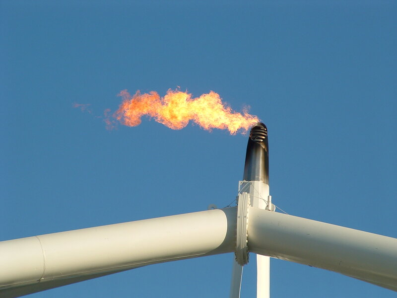 Gas flare at industrial site
