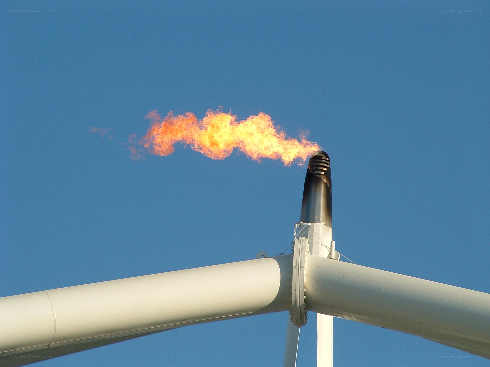 Gas flare at industrial site