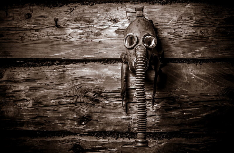 Gas Mask on Wood Wall
