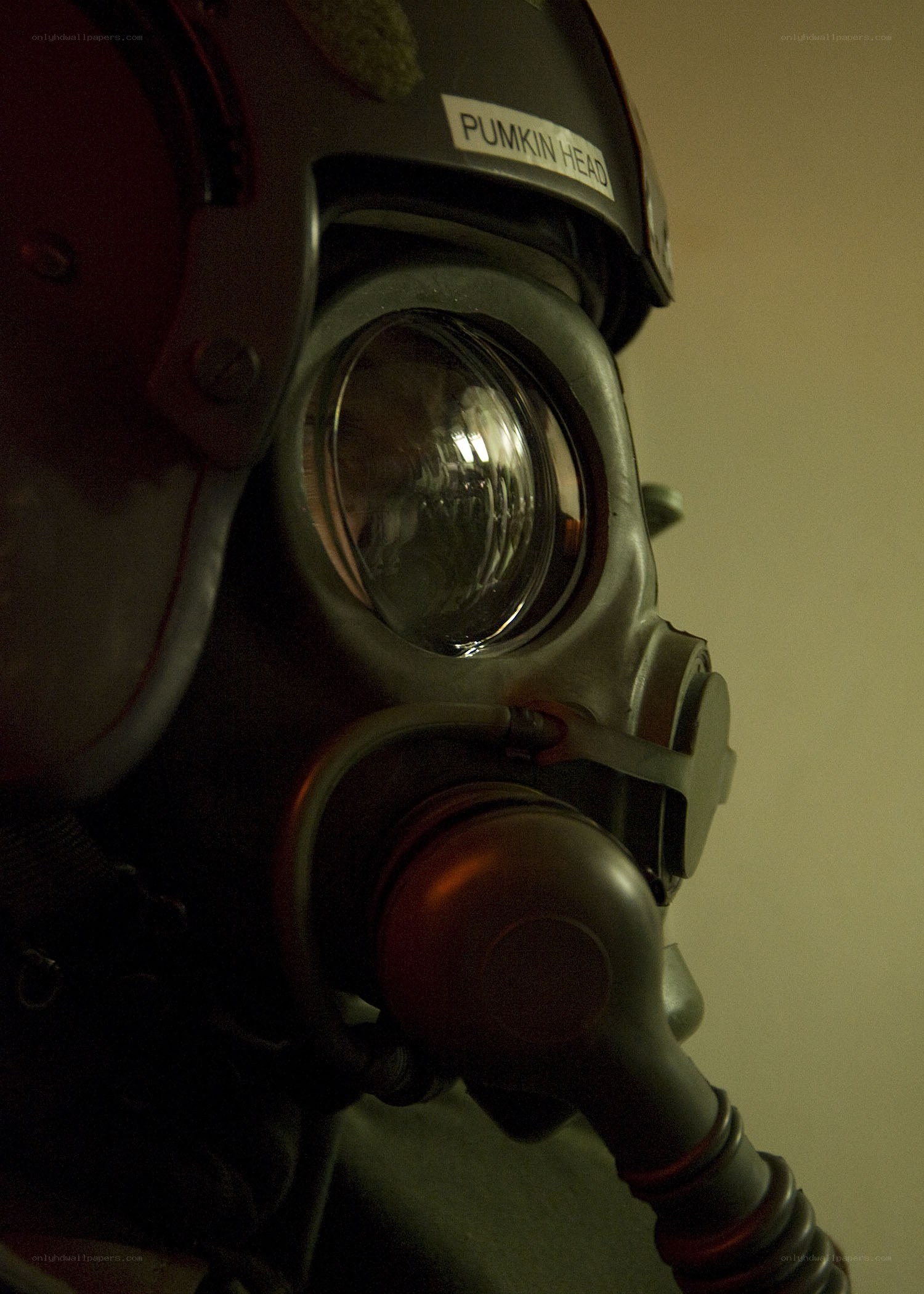 gas mask with pumpkin head label