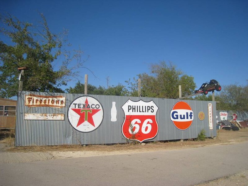 Gas Station Signs on Wall