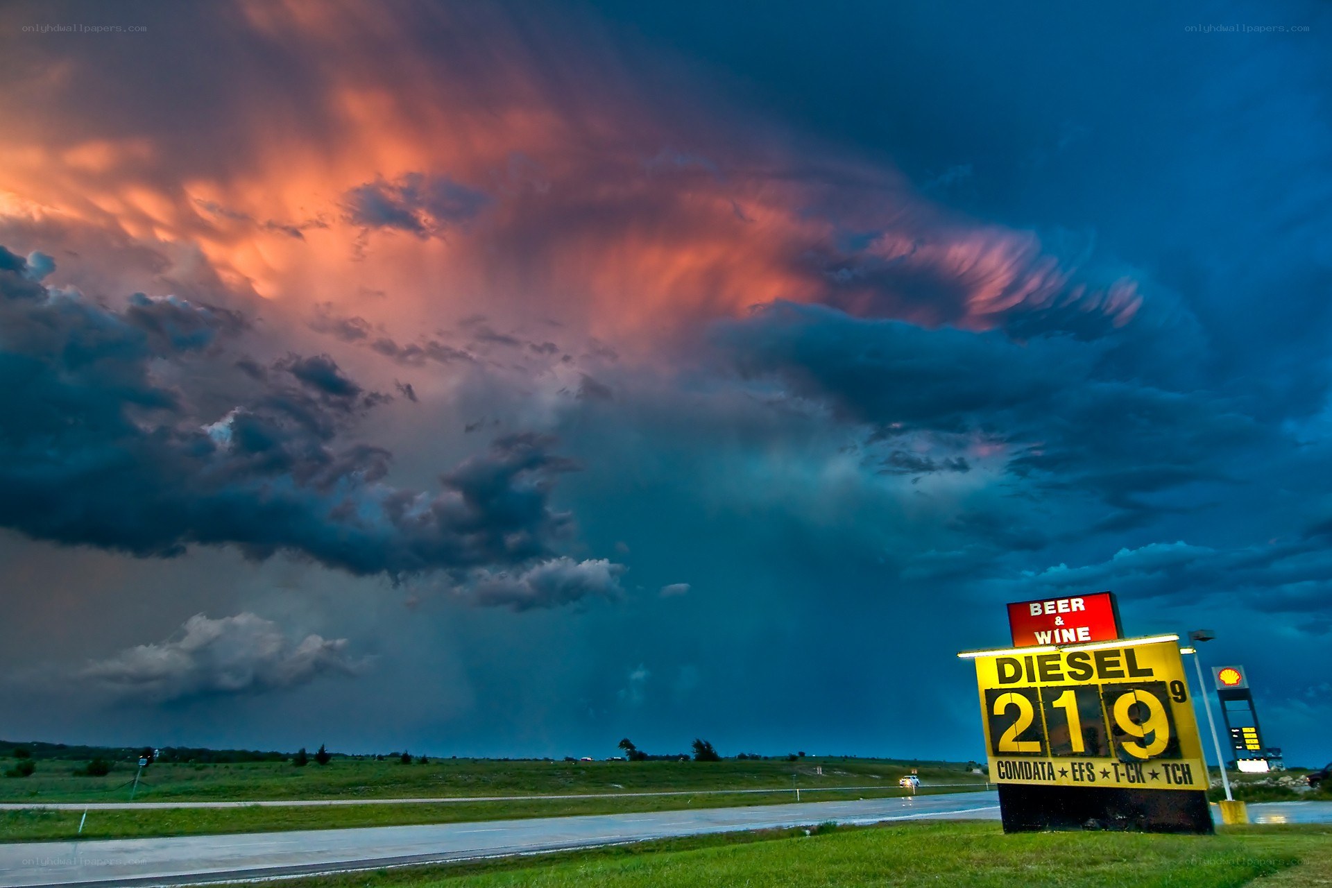 Gas station under stormy sky