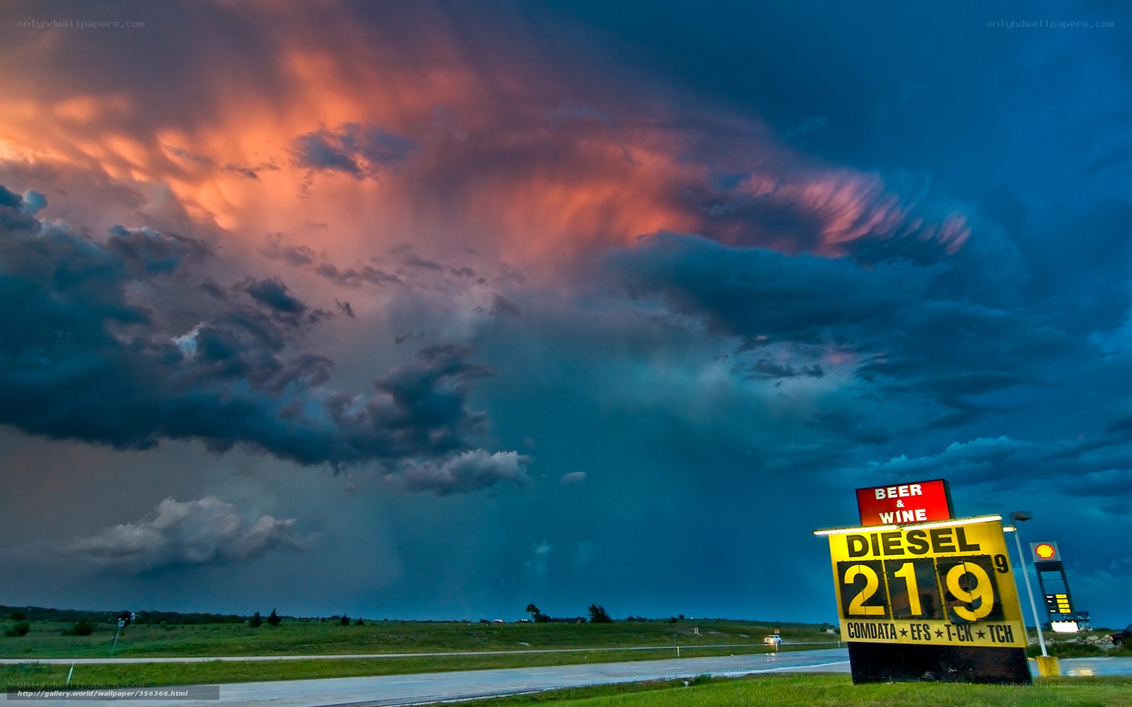 Gas station under stormy sky