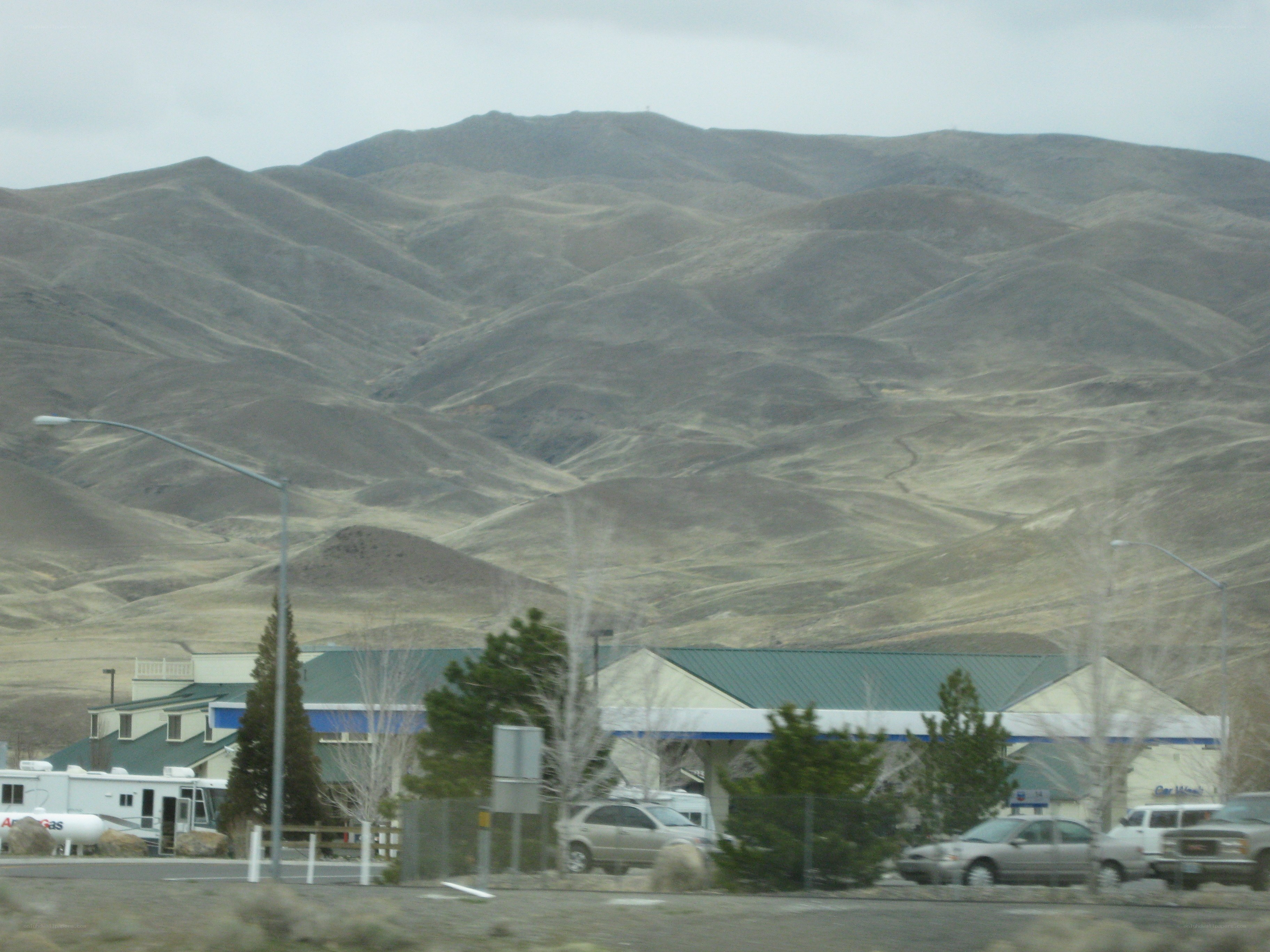 Gas station with mountains in background