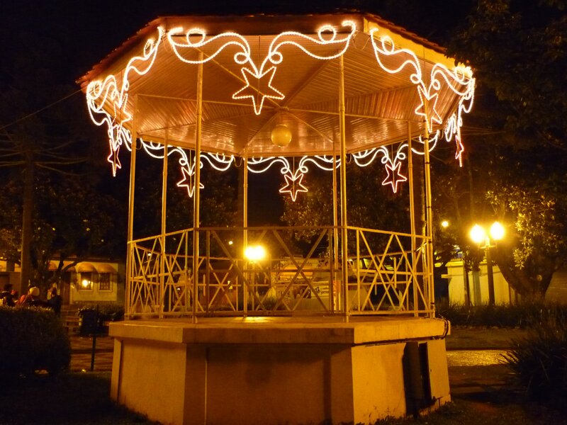 Gazebo with holiday lights at night