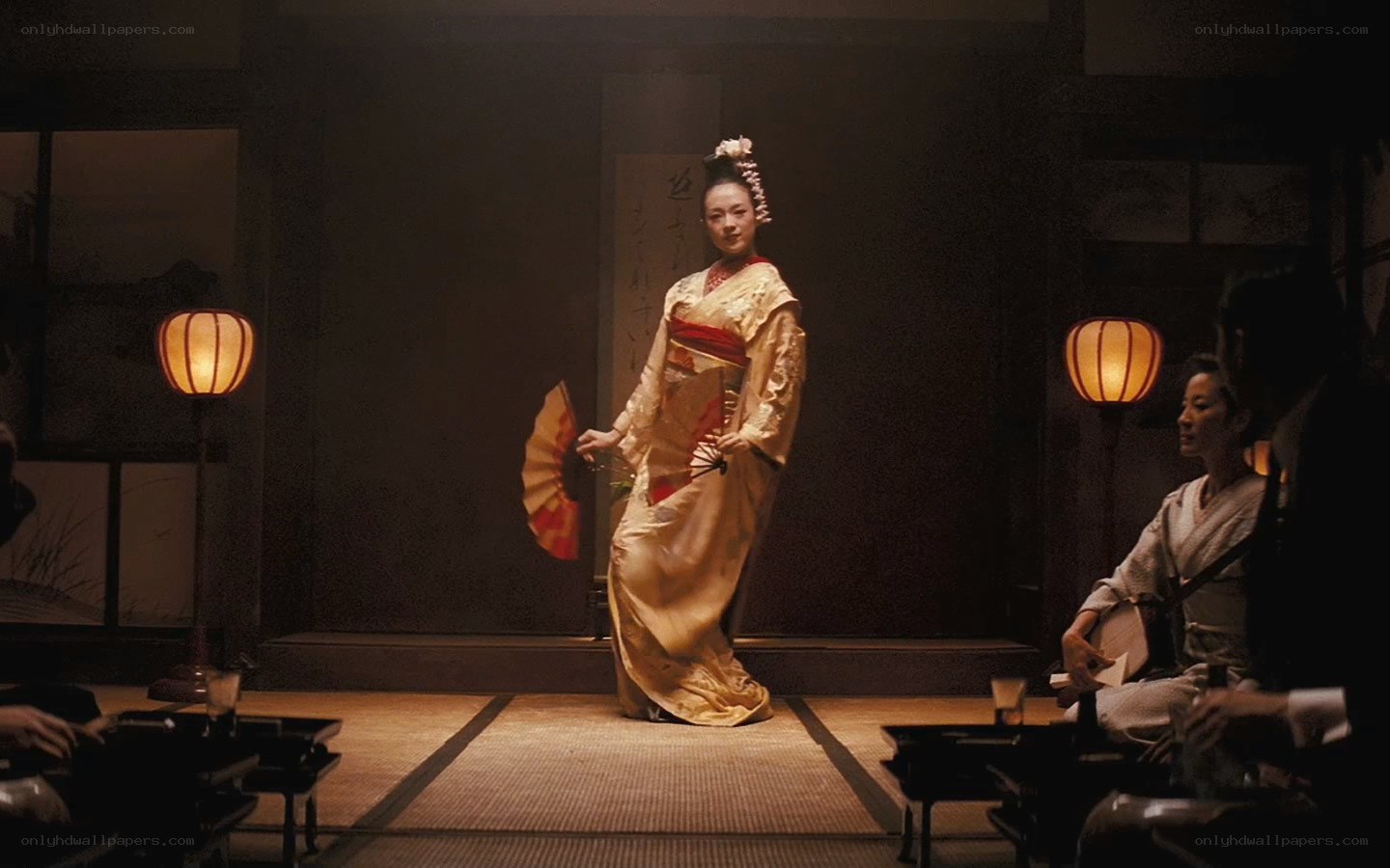 Geisha performing in a traditional room