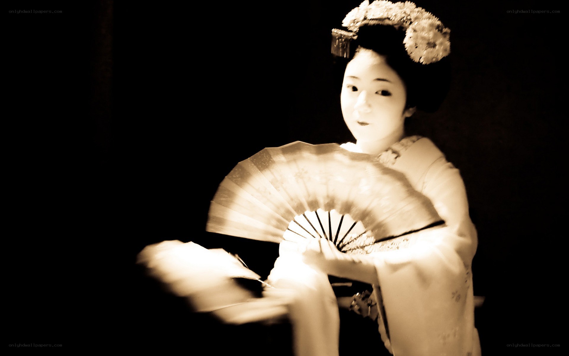 Geisha with fan in sepia