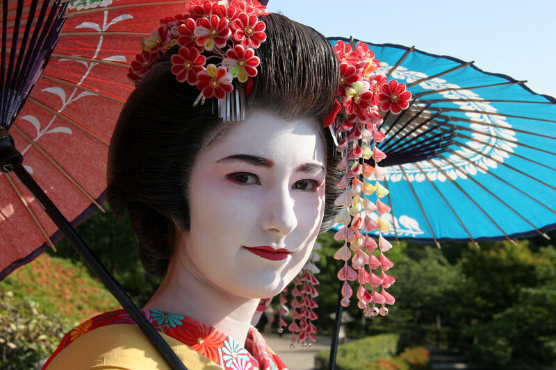 Geisha with traditional umbrella