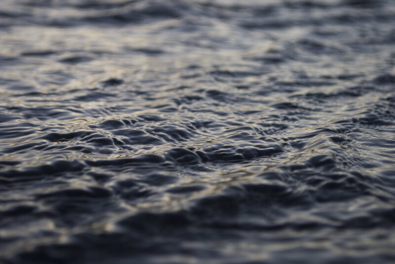 gentle water ripples at dusk
