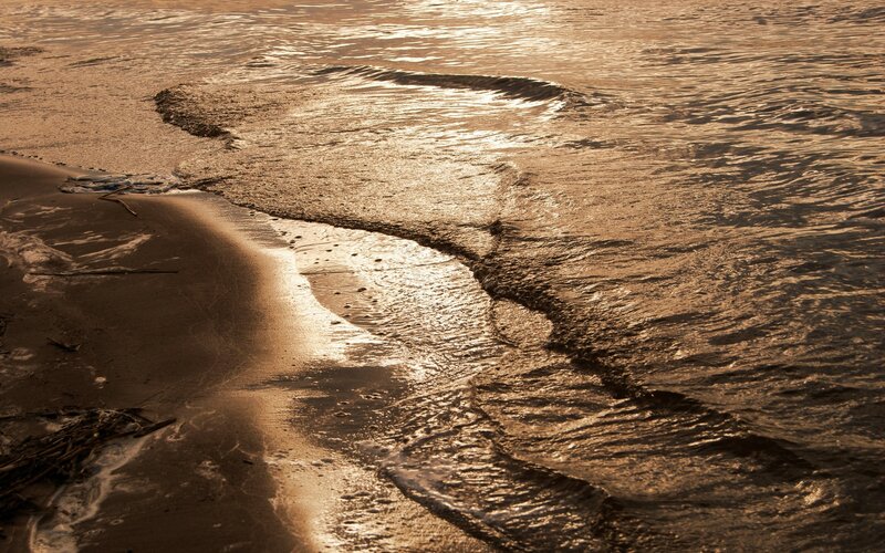 gentle waves at sunset
