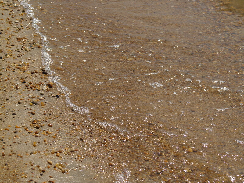 gentle waves on pebble beach