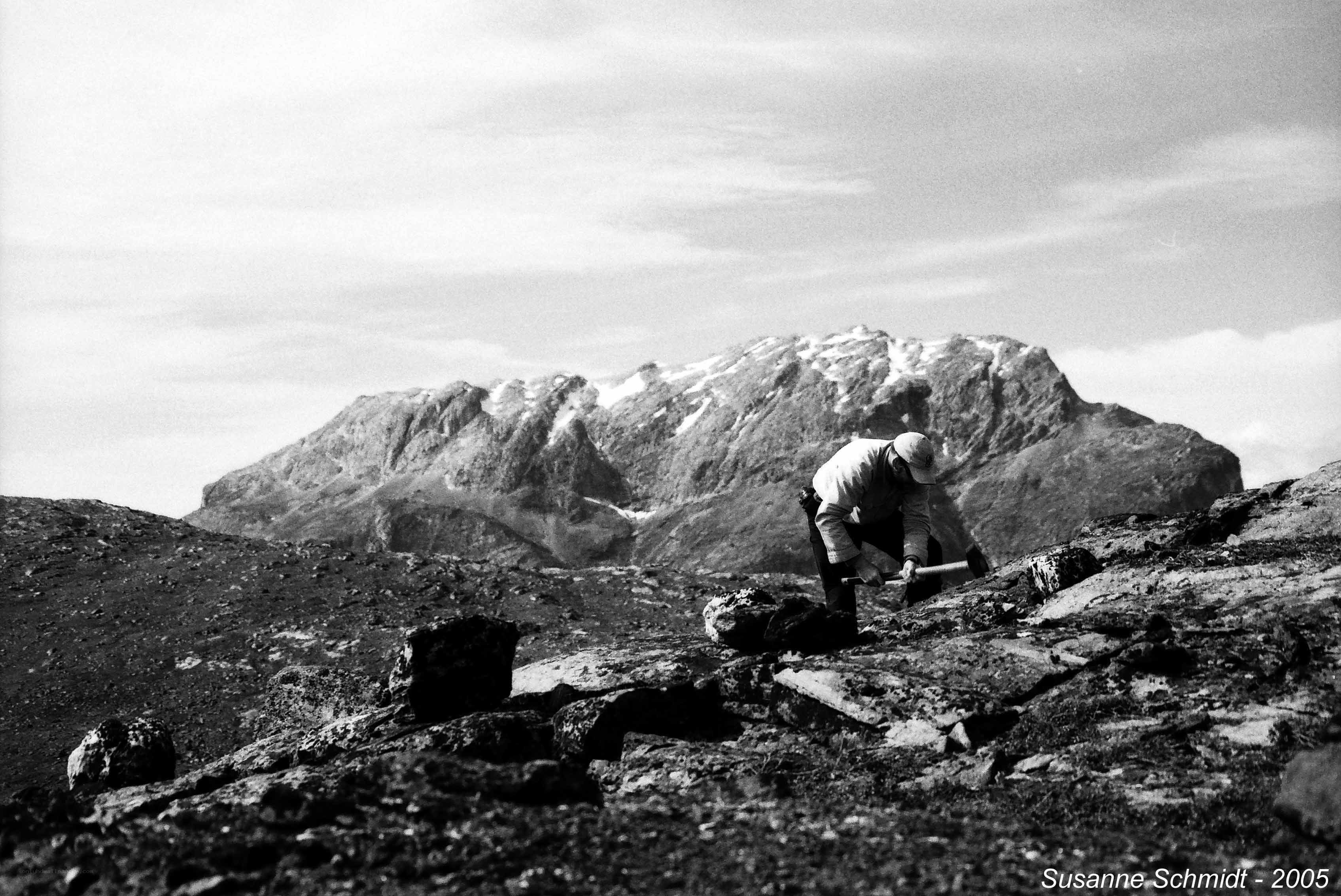 Geologist working in mountainous terrain