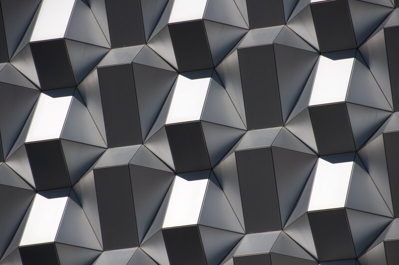 Geometric Building Facade — Gray, Dramatic, Afternoon