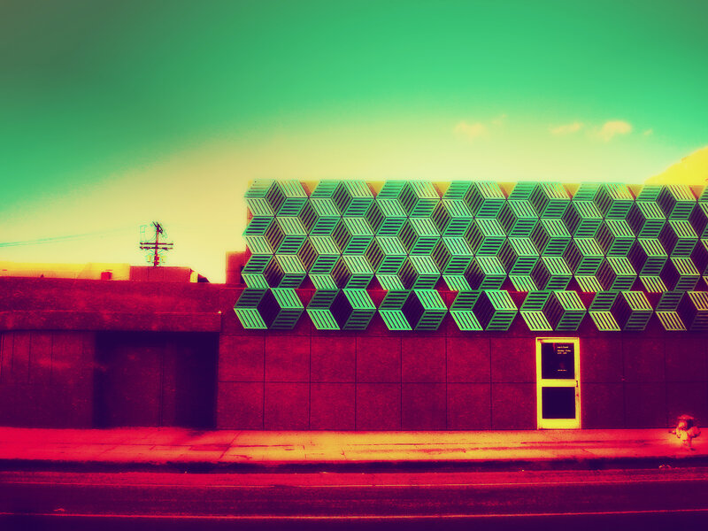 Geometric Building Facade — Green, Dramatic, Sunset