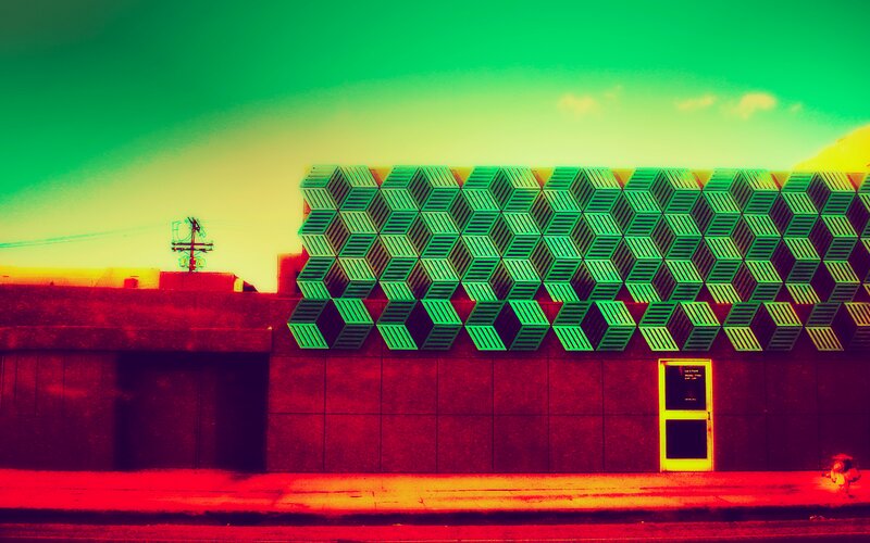 Geometric Building Facade — Green, Dramatic