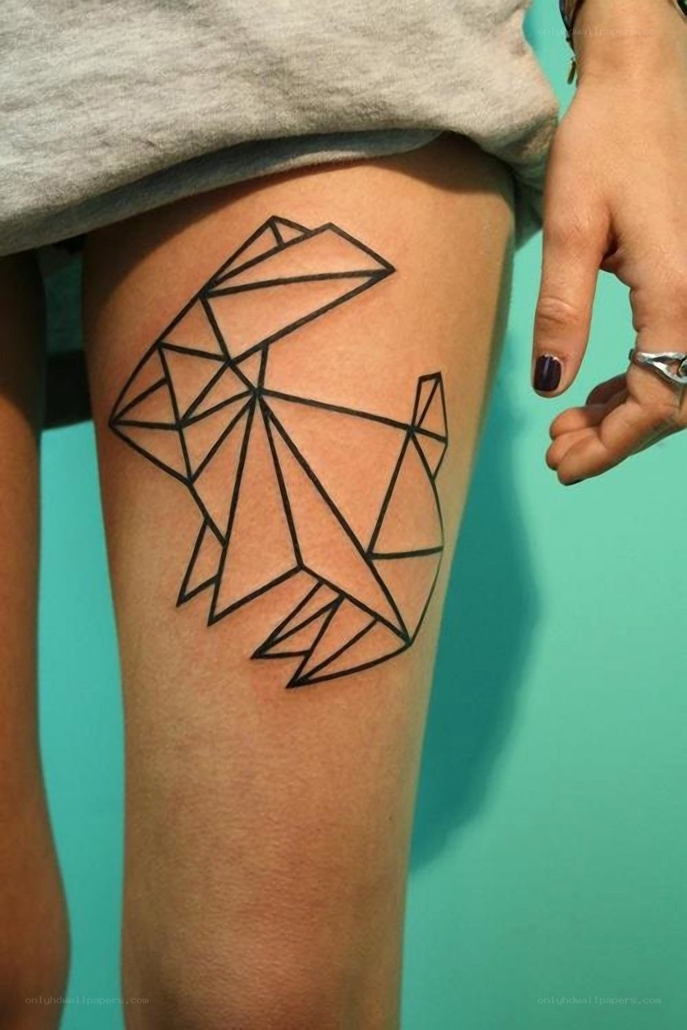 geometric fish tattoo