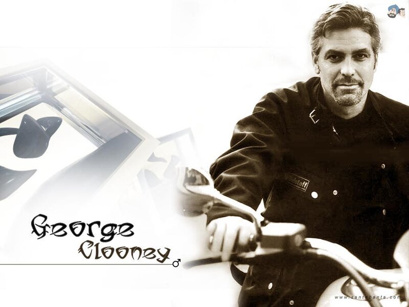 George Clooney on a motorcycle