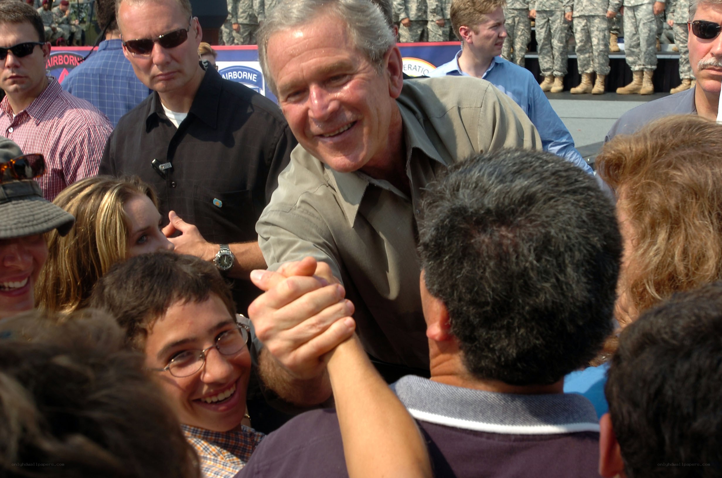 George W. Bush shaking hands with crowd