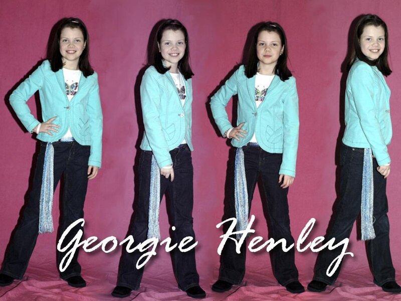 Georgie Henley in blue jacket