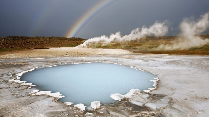 Geothermal pool with rainbow
