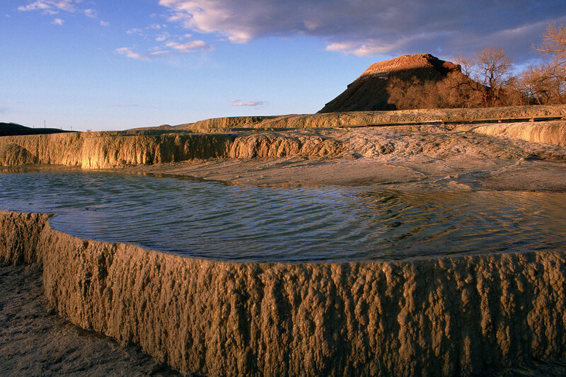 geothermal terraces at sunset