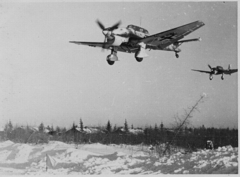 German aircraft in flight over snow