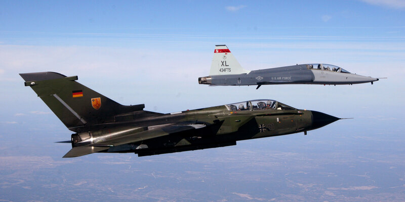 German and U.S. fighter jets in formation