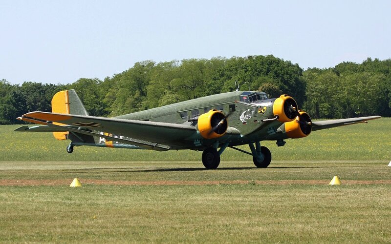 German military aircraft on grass field