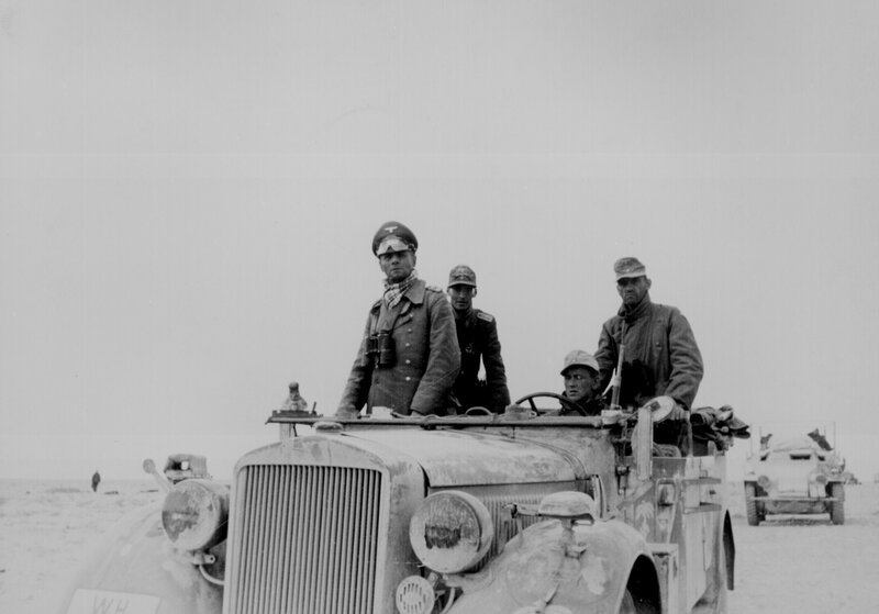 German officers in desert vehicle