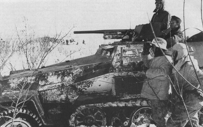 German soldiers with armored vehicle