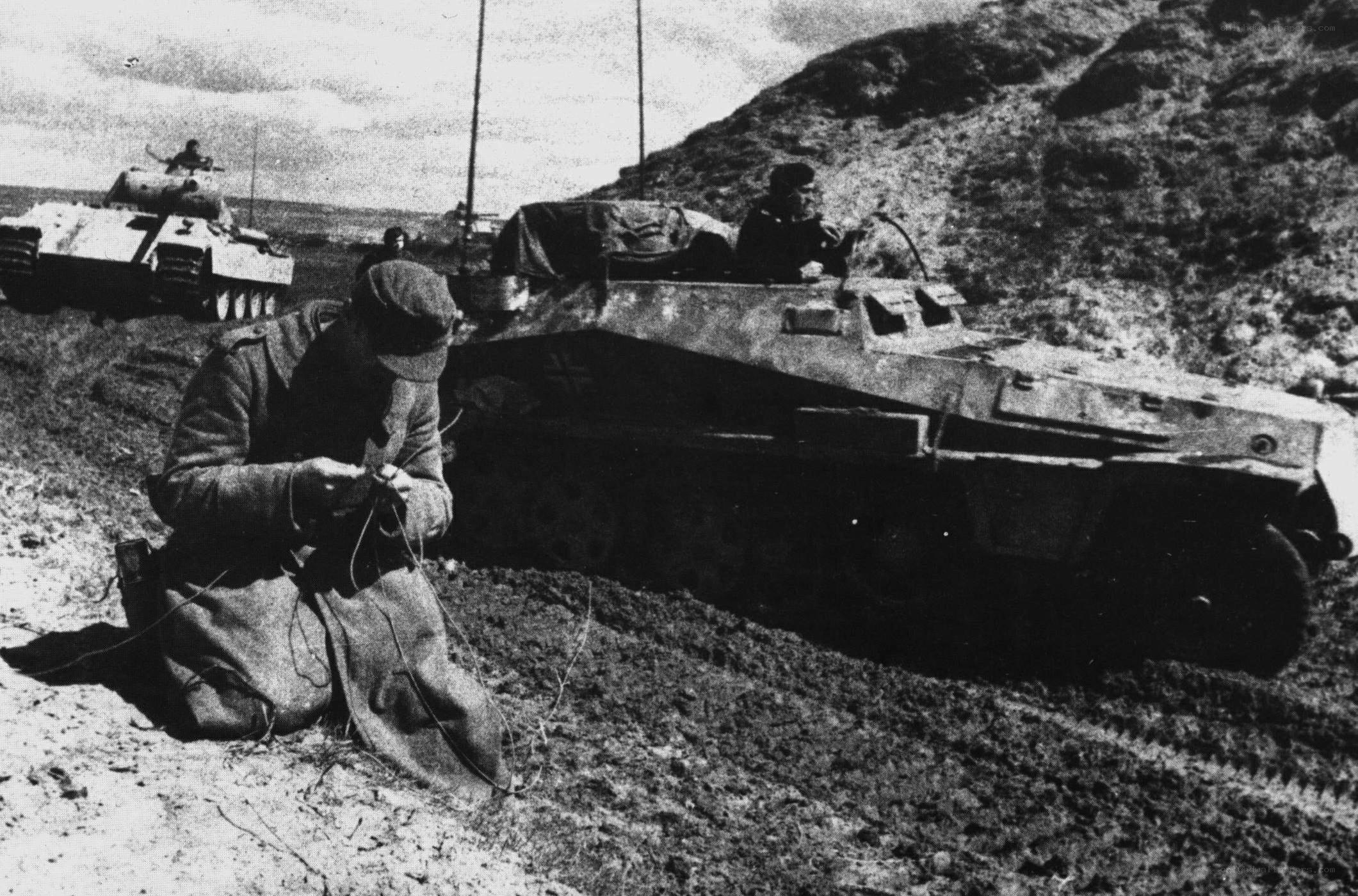 German soldiers with armored vehicles
