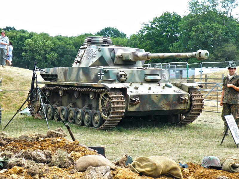 German Tank on Display — Green, Outdoor, Afternoon, Photograph, People