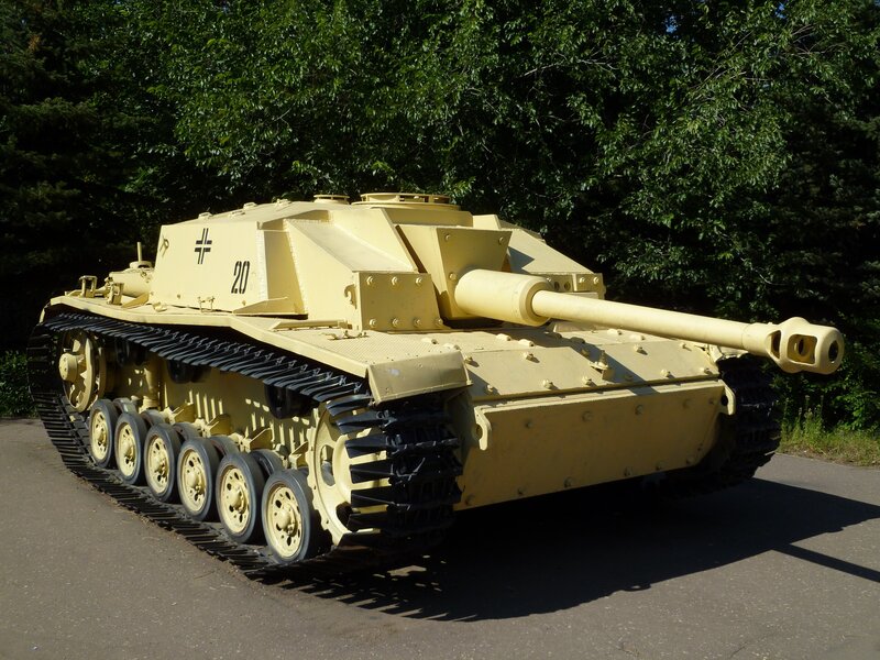 German Tank on Display — Yellow, Static, Afternoon, Photograph, Trees