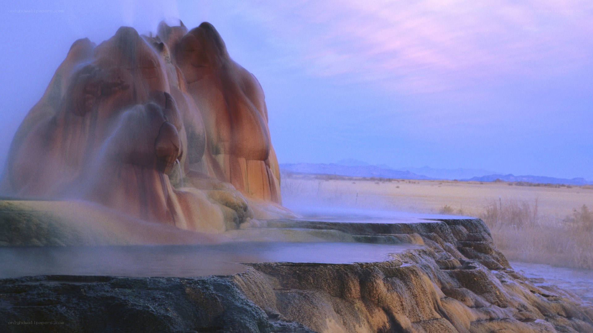 geyser at dawn in desert