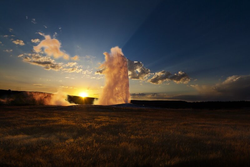 Geyser Erupting at Sunset — Blue, Dramatic, Photograph, Sun