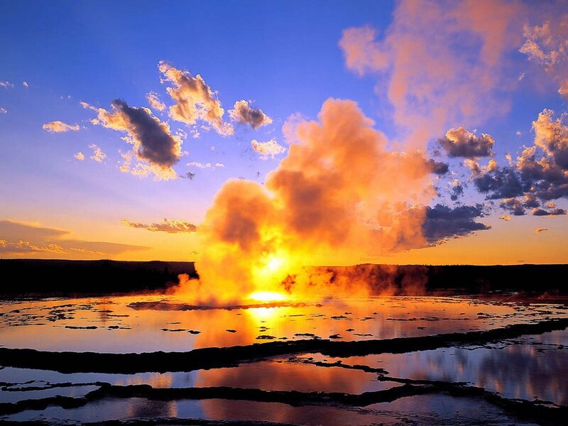 Geyser Erupting at Sunset — Orange, Dramatic, Photograph, Clouds, Water