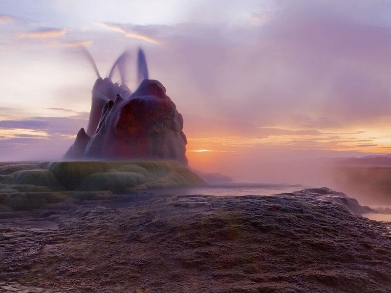 Geyser Erupting at Sunset — Purple, Dramatic