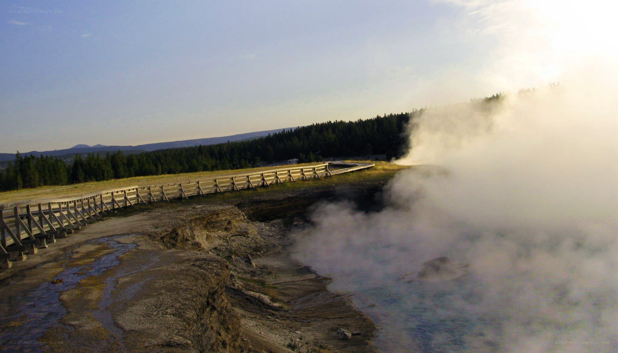 geyser erupting at yellowstone