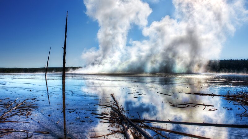 Geyser Erupting in Lake