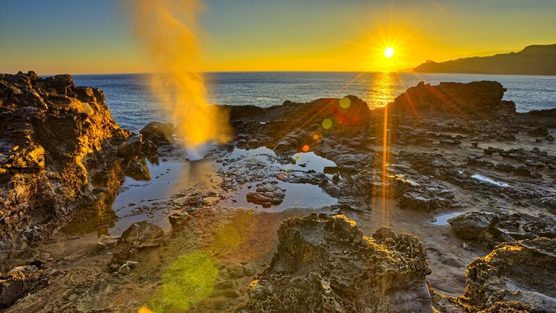 Geyser on Rocky Shore — Yellow, Dramatic